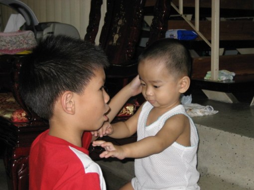 Darrell and Jason vying for each other's attention.