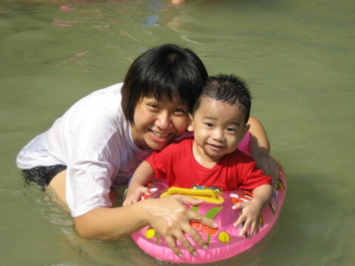 Jason and mommy having a go at the waters.